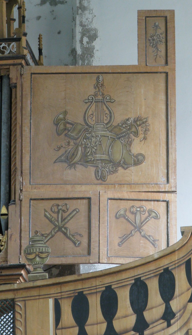 Noorder luik met muziekinstrumenten