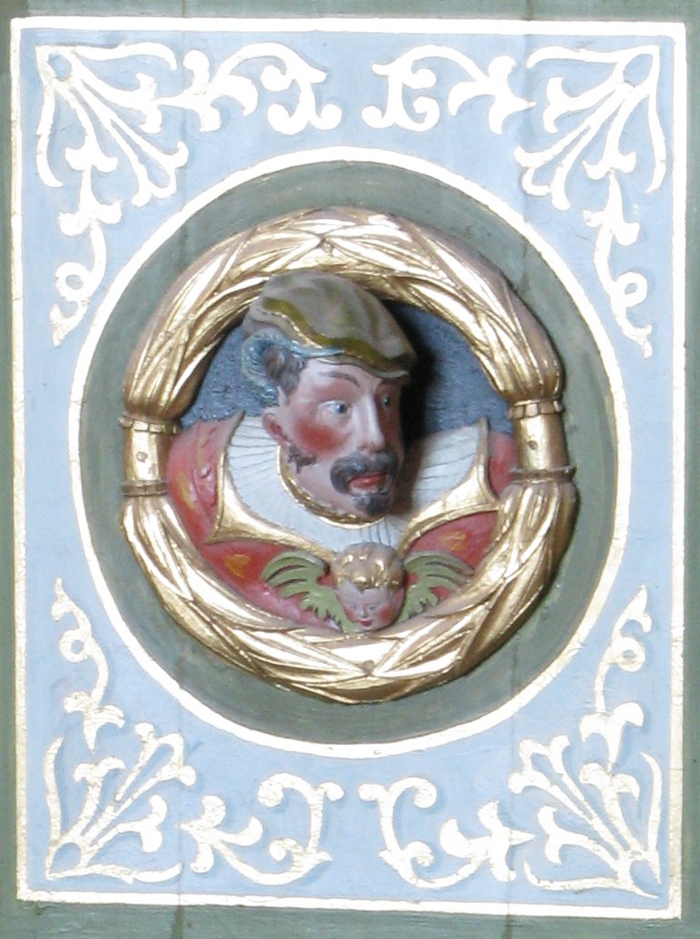 Mannenkop op zijkant Balustrade, rechts van het Rugpositief