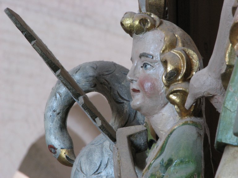 Bekroning Rugpositief vanuit het westen, close-up pelikaan en luitspeler