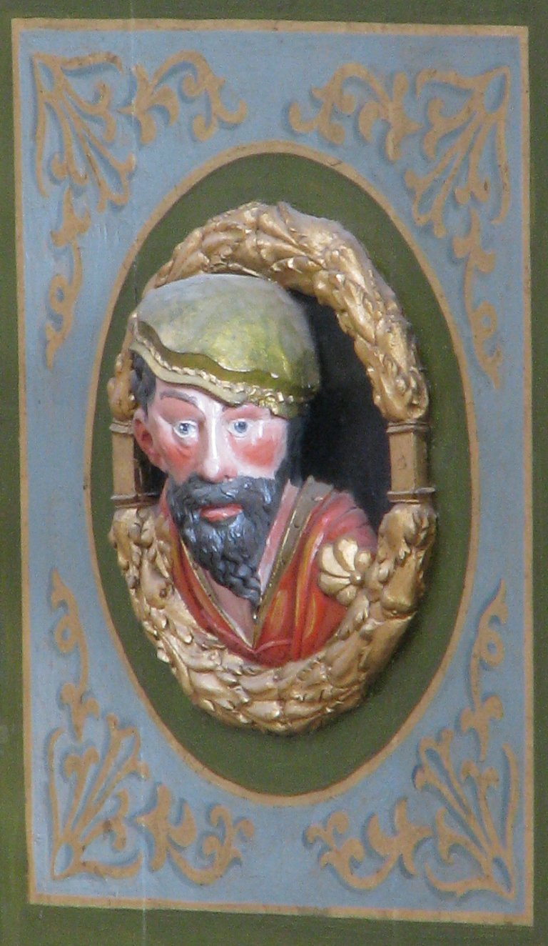 Mannenkop op Balustrade, rechts van het Rugpositief