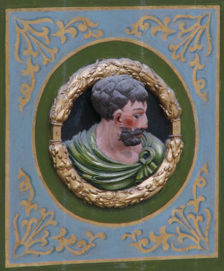 Mannenkop op Balustrade, links van het Rugpositief