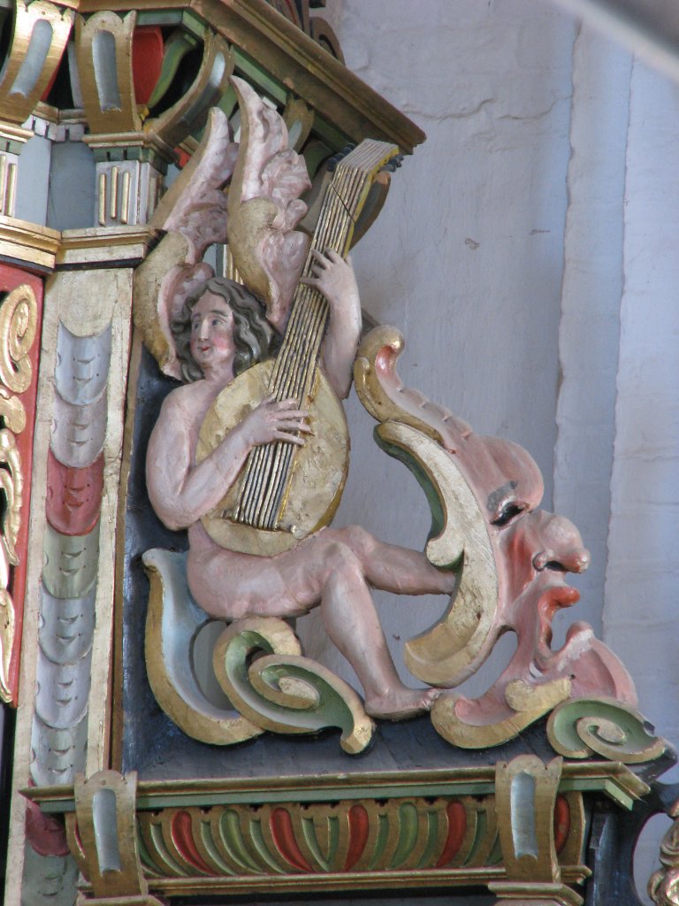 Hoofdkast, zittende luitspeler westelijk vleugelstuk