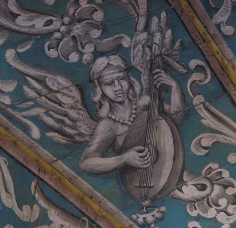 Schilderwerk onder het orgel - luitspeelster